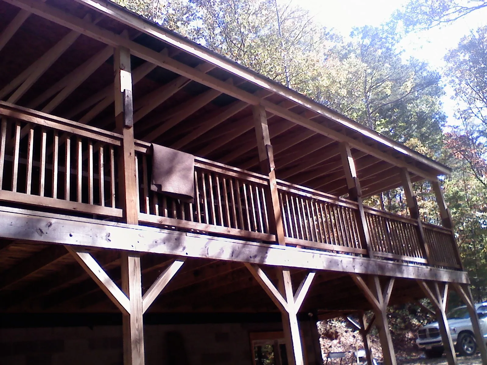 Timber framing under a new elevated porch and deck — Roof Leak Repair in Tyler by Roofing Brothers